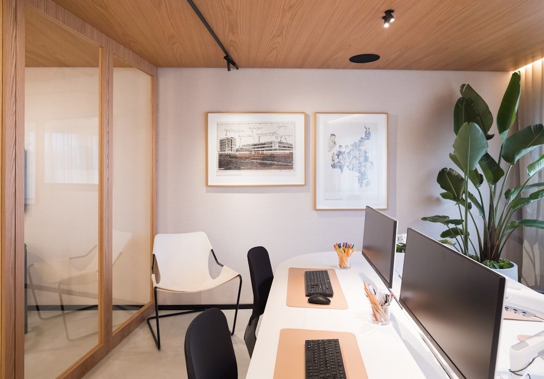 Nature-inspired office design featuring organic curves, natural materials, and adaptive workstations surrounded by biophilic elements